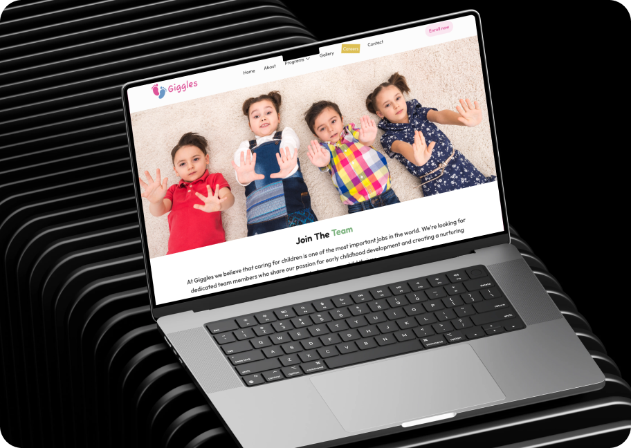 Giggles Platform — laptop mockup showing the homepage with happy children and the tagline Safe, Loving Care for Your Littlest Love